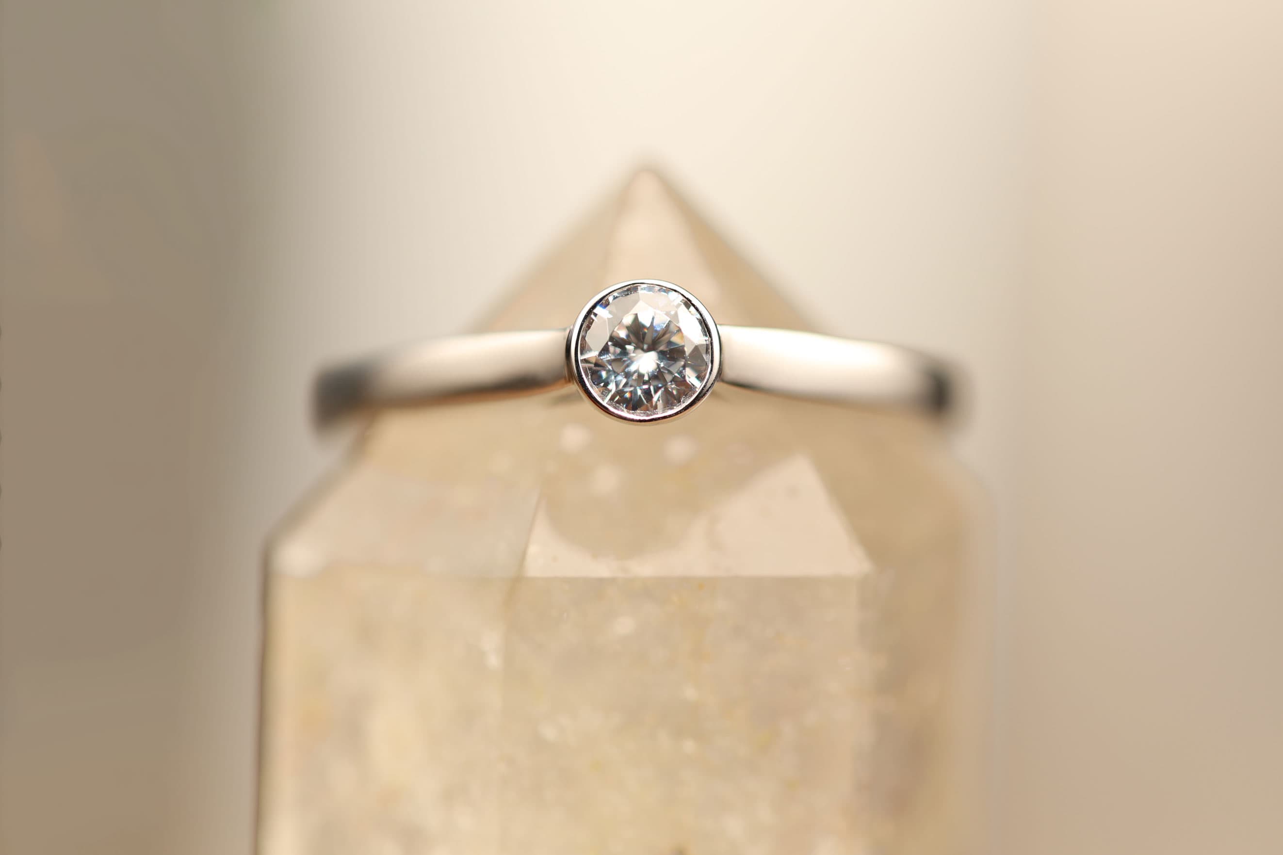 Silver solitaire ring with a round brilliant memorial diamond